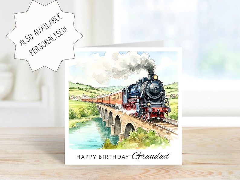 May include: A square greeting card featuring a watercolor illustration of a black steam locomotive pulling red passenger cars across a stone viaduct over a river. The text reads "ALSO AVAILABLE PERSONALISED!" and "HAPPY BIRTHDAY Grandad".