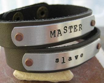 Master and Slave, Set of 2 Personalized Leather Cuff Bracelets, 1/2 inch leather cuff, choose your own metal, wording, font, and cuff color