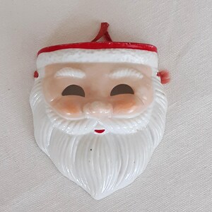 Vintage Silvestri Santa Claus Face Mask Christmas Ornament Wall Hanging.