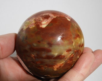 China Hollow Opal-amazing colors! 65mm diameter hand made