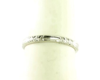 Sharp Platinum Wedding Band With a Gorgeous Art Deco Floral and Bar Styled Design