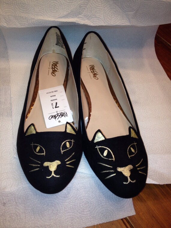 shoes with cat faces on them