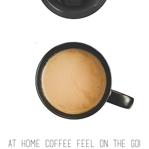 May include: A set of two travel mugs with a wood grain design and a black lid. The mugs have a black band with a diamond pattern. The text "WORLD'S FIRST FULL CERAMIC LID! patent pending design" is at the top of the image. The text "AT HOME COFFEE FEEL ON THE GO!" is at the bottom of the image.