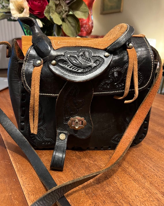 Handmade weekender bag by WesternSkiesHandmade. Hand-carved top with  acid-washed cowhide body an… | Hand tooled leather, Leather bags handmade,  Western bags purses