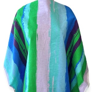 May include: A colorful fabric with a striped pattern in shades of blue, green, purple, and white. The fabric has a brushstroke effect, giving it a unique and artistic look.