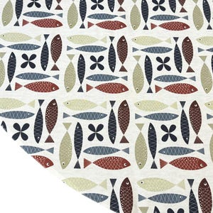 May include: A fabric with a repeating pattern of stylized fish in shades of red, blue, and beige on a white background. The fish are arranged in rows and columns, with some vertical and some horizontal.