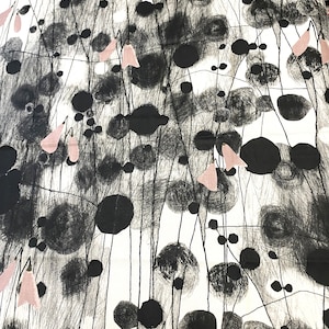 May include: Fabric with an abstract design. The white background is patterned with black circles and lines. Pink bell-shaped floral elements are scattered across the fabric, creating a unique pattern.