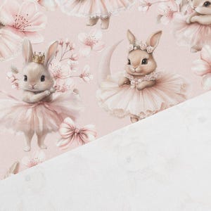 May include: A repeating pattern featuring adorable bunnies in pink tutus and floral crowns, surrounded by cherry blossoms and bows. The bunnies are depicted in a whimsical, fairytale style, set against a soft pink background.