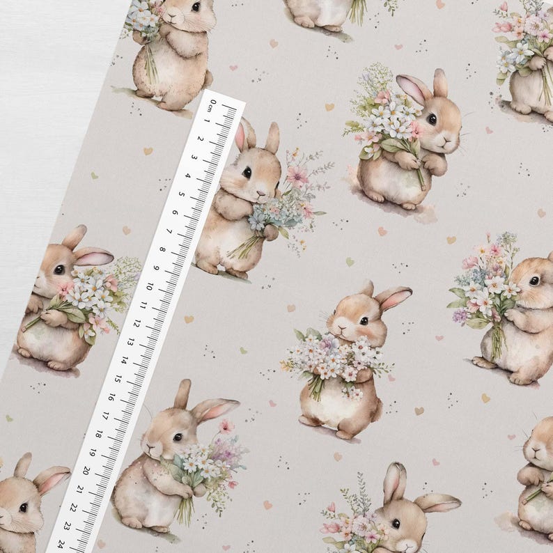 May include: A seamless pattern featuring a repeating design of brown bunnies holding bouquets of pastel flowers on a light gray background with scattered pink hearts.