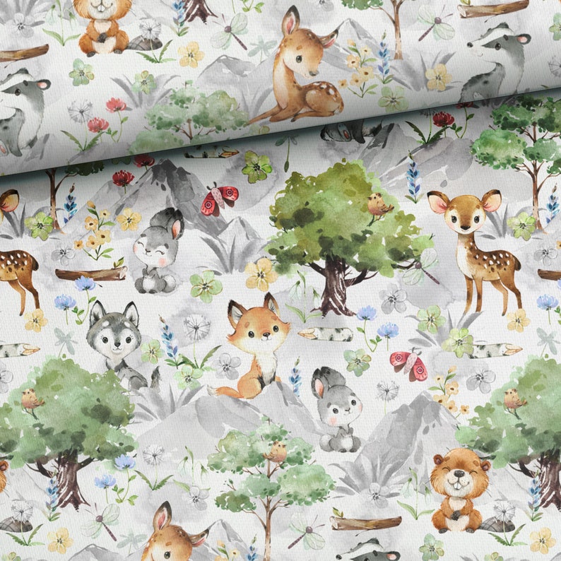 May include: A white fabric with a repeating pattern of woodland animals and plants. The animals include deer, foxes, rabbits, squirrels, and a beaver. The plants include trees, flowers, and leaves. The fabric is perfect for crafting projects, such as quilts, pillows, and bags.