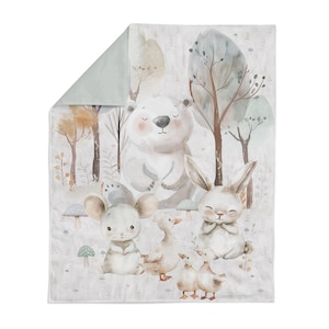 May include: A watercolor illustration of a white bear, a rabbit, a mouse, and three ducklings in a forest setting. The animals are surrounded by trees, mushrooms, and flowers. The illustration is done in soft, muted colors.