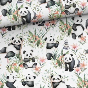 May include: A white fabric featuring a repeating watercolour pattern of black and white pandas in various poses, including sitting, climbing, and eating bamboo, interspersed with green tropical foliage, bamboo stalks, and pink lily flowers.