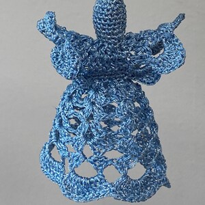 May include: A blue crocheted angel ornament with a delicate, lacy design. The angel has a long, flowing gown and outstretched wings.