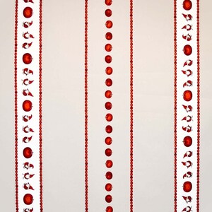 May include: A white background with five vertical red stripes. Each stripe is decorated with a repeating pattern of red circles and red stylised gnomes.