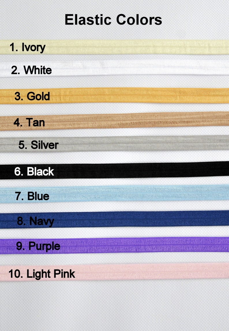 May include: Ten different colors of elastic, labeled with numbers 1 through 10. The colors are ivory, white, gold, tan, silver, black, blue, navy, purple, and light pink.