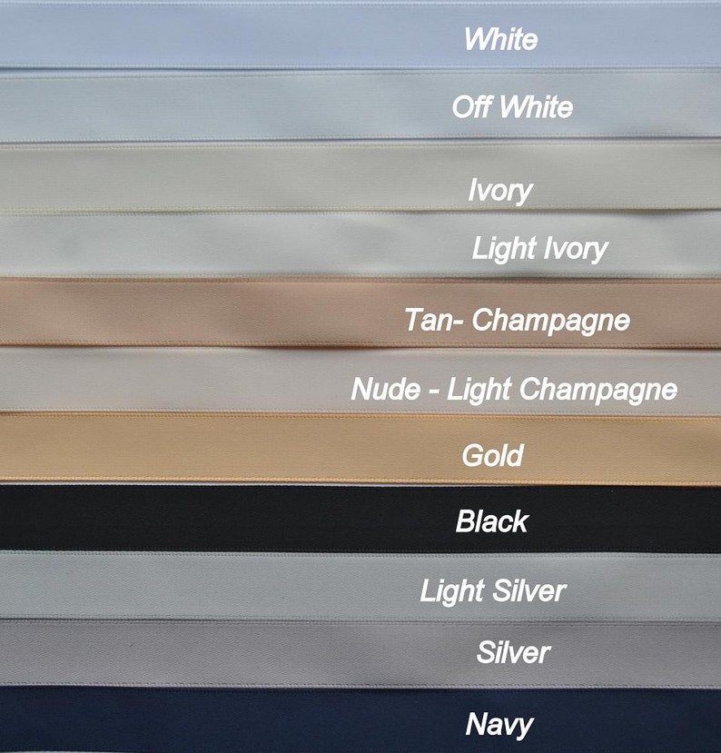 May include: A close-up of 11 different colored ribbon samples. The colors are white, off white, ivory, light ivory, tan-champagne, nude-light champagne, gold, black, light silver, silver, and navy.