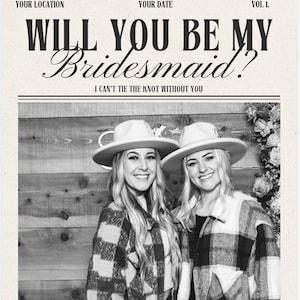 May include: A black and white photo of two women wearing hats and plaid shirts. The text "WILL YOU BE MY BRIDESMAID?" is printed on a newspaper-style background. The text "I CAN'T TIE THE KNOT WITHOUT YOU" is printed below the main text.