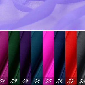 May include: A swatch card with 11 different fabric colors. The colors are: beige, navy blue, magenta, forest green, purple, teal, hot pink, dark blue, red, gray, and cream.