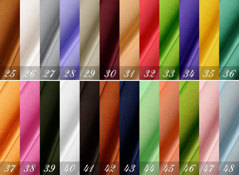 May include: A swatch card with 48 different fabric samples. The swatches are arranged in two rows of 24. The swatches are in a variety of colors, including red, blue, green, yellow, and orange.