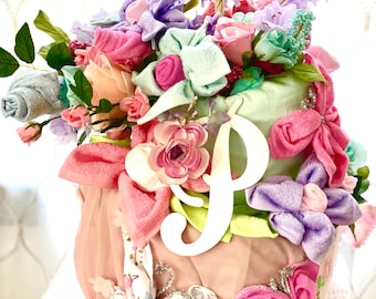 Baby in bloom diaper cake