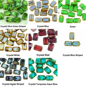 Puede incluir: Surtido de cuentas de vidrio en varios colores y patrones, incluyendo verde oliva rayado, azul cristal, verde, blanco cristal, rojo cristal, azul cristal rayado, ágata cristal rayado y turquesa aqua azul cristal.