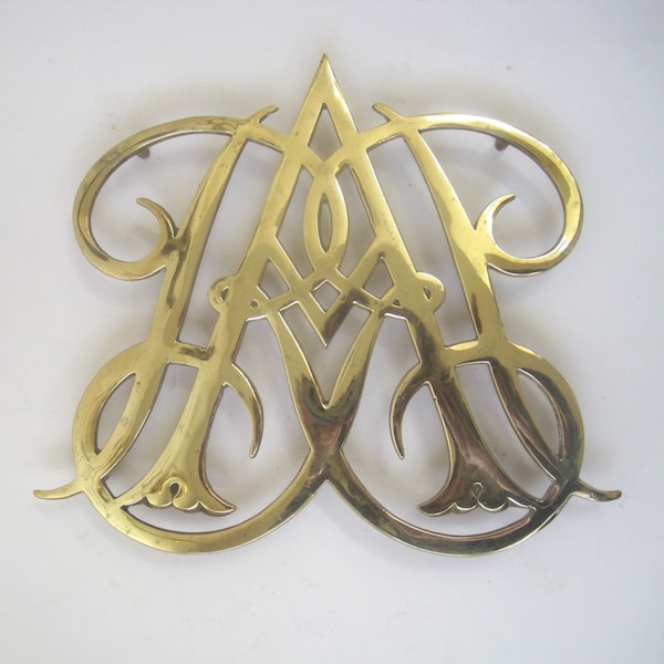 Virginia Metalcrafters Queen Anne Cypher Brass Footed Trivet, 9" x 10.25", Williamsburg Reproduction, (c)1950. USA