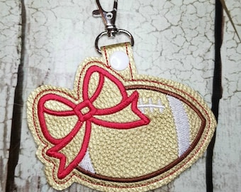In the Hoop Football with Bow Snap Tab Embroidery Design, ITH Embroidery Key Fob Designs