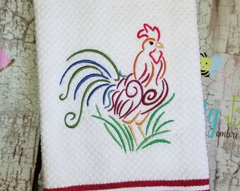 May include: A white kitchen towel with red stripes at the bottom. A colorful embroidered rooster design is centered on the towel.