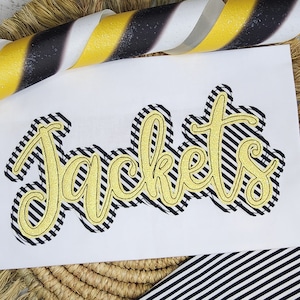 May include: A black and white striped design with the word "Jackets" in gold glitter lettering.