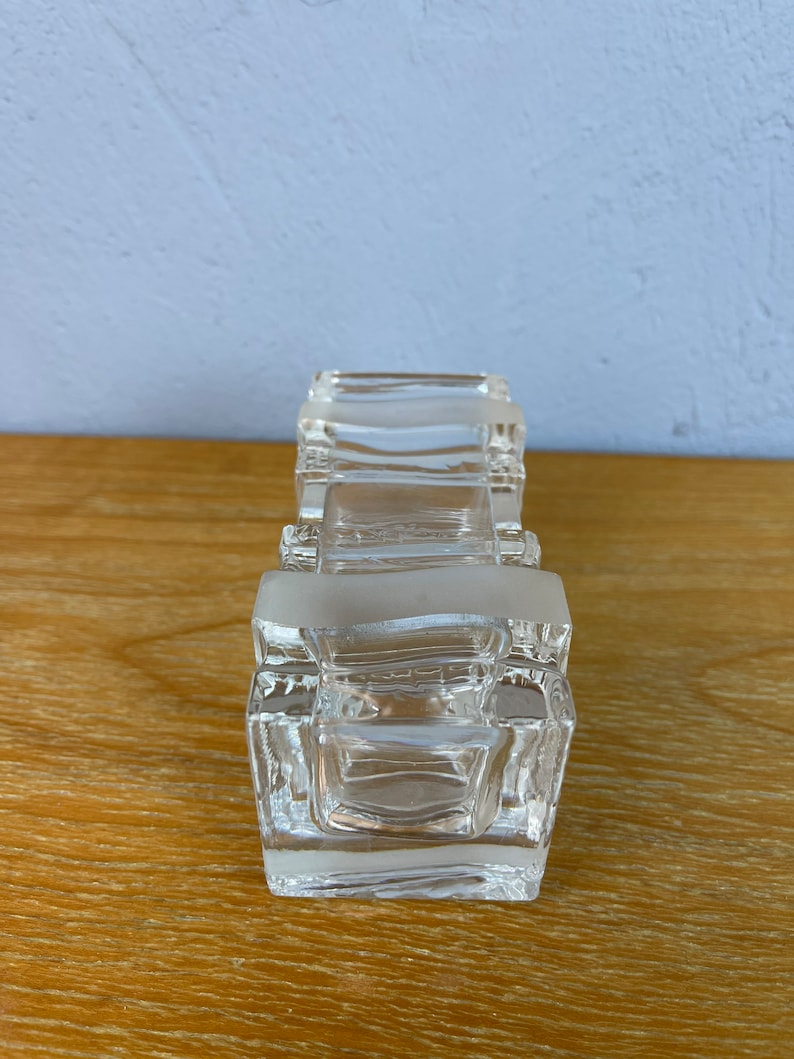 May include: A clear glass rectangular dish with a frosted design. The dish is made of multiple stacked pieces of glass.