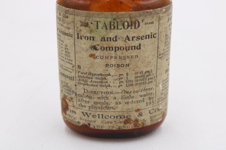 May include: An antique brown glass bottle with a label that reads "TABLOID Iron and Arsenic Compound." The label includes the word "POISON" and directions for use. The bottle is from 1951.