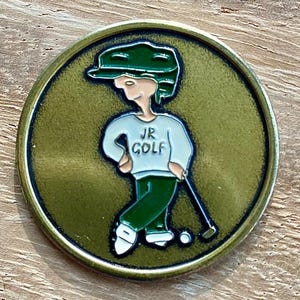 Excelente marcador de pelota de golf de metal pintado a mano para niños. Regalo ideal para cumpleaños de golfistas. Marcador de pelota vintage de EE. UU. sin usar, nuevo