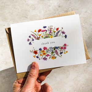 Wildflower watercolor floral folded thank you cards and envelopes for weddings, events and general thank you cards.