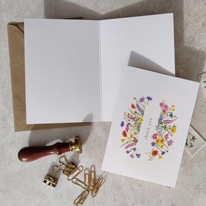 Wildflower watercolor floral folded thank you cards and envelopes for weddings, events and general thank you cards.