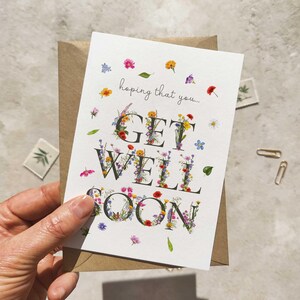 Tarjeta y sobre con mensaje "Que te mejores pronto" de Wildflower Letters