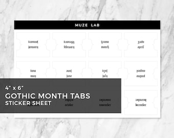 Hoja de pegatinas con pestañas mensuales góticas blancas