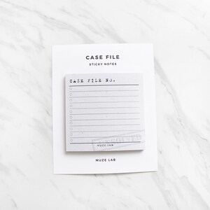 May include: White sticky notes with the text "Case File" and "Case File No." printed on them. The notes are on a white background.
