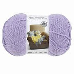 May include: A skein of lavender-colored yarn with a label that reads "Red Heart  Artiste  Yarn".