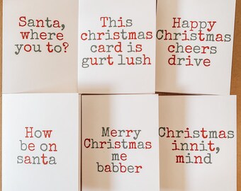 Bristol & Somerset Christmas cards with West Country sayings in red and green typewriter style . Gurt lush, me babber, cheers drive