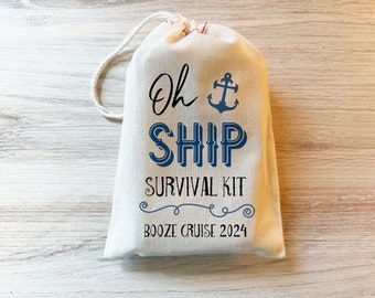 May include: A cream-colored fabric drawstring pouch featuring the blue text Oh SHIP with an anchor icon, followed by the black text SURVIVAL KIT and BOOZE CRUISE 2024, separated by a decorative blue swirl line printed on the front of the bag.