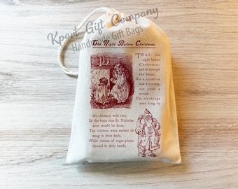 May include: A white cotton drawstring bag with red text and illustrations. The text reads "The Night Before Christmas" and includes the first verse of the poem. The bag is perfect for gift giving.