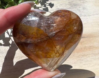 Stunning clear golden healer heart with huge crystal clear windows | master healer crystal | red brown quartz carving | 2 x 2 inch