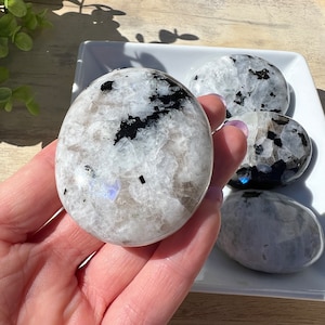 Rainbow moonstone palm polished crystal with blue flash