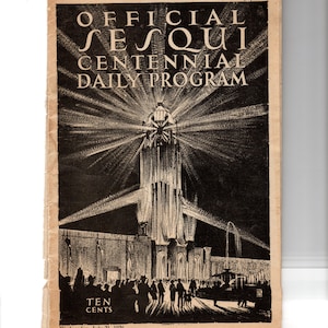 May include: A vintage 1926 Official Sesqui Centennial Daily Program booklet with a black and white illustration of a tall illuminated tower emitting light beams. The text reads Official Sesqui Centennial Daily Program, Ten Cents, and July 21, 1926.