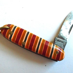 May include: A rustic wooden sign with the text "Welcome to our home" in a handwritten style. The sign features a distressed finish and a simple, inviting design, perfect for entryway decor.