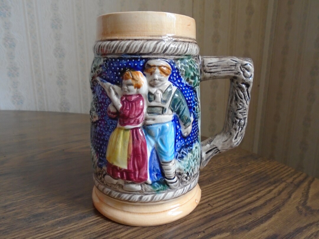 Vintage Stein, Man Teaching Woman to Use Shotgun, Wiesbaden Haus