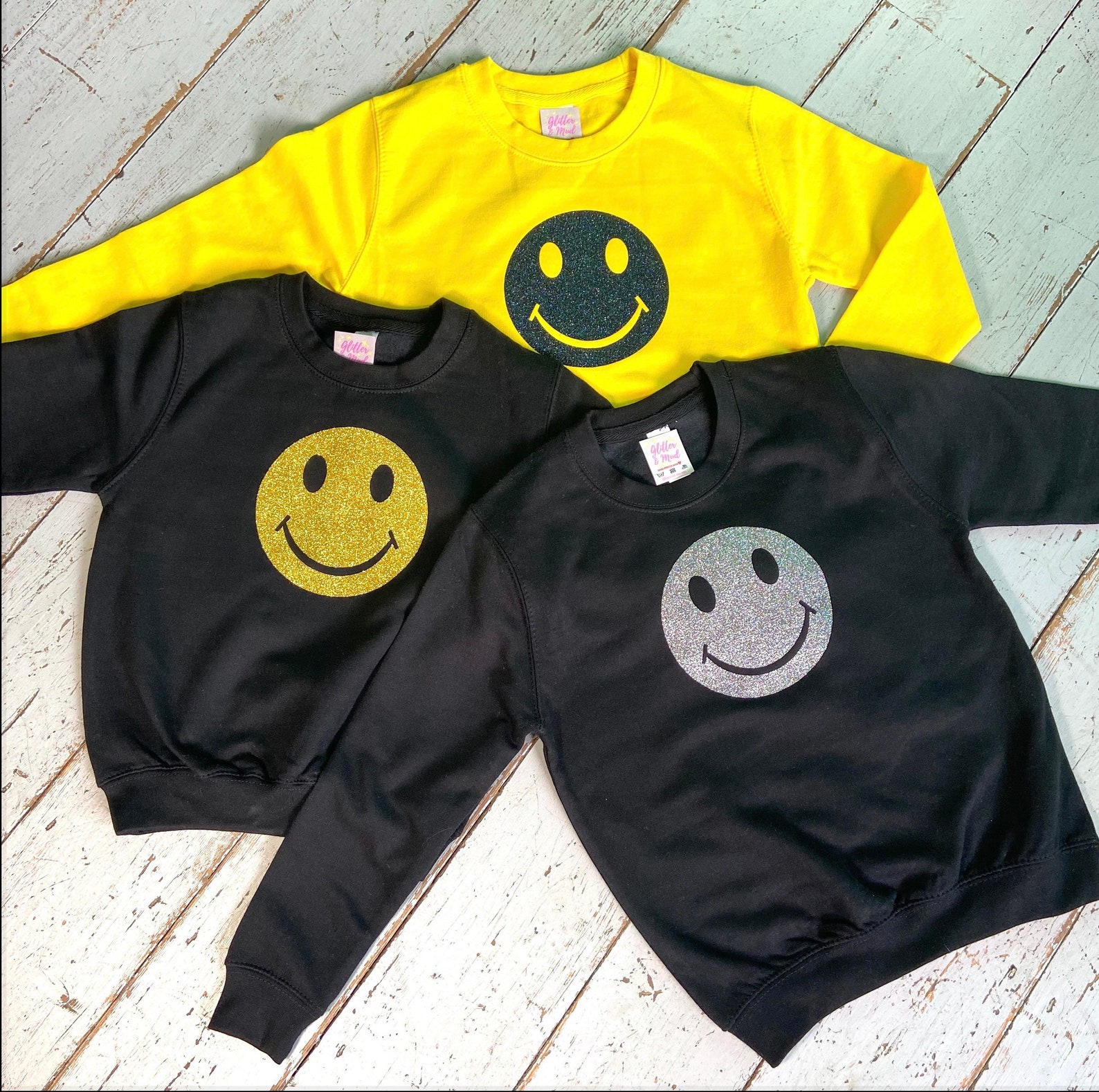 yellow smiley face jumper