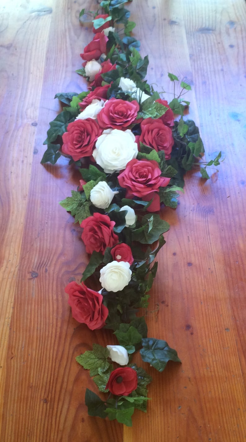 Red and white paper flower arch or table runner