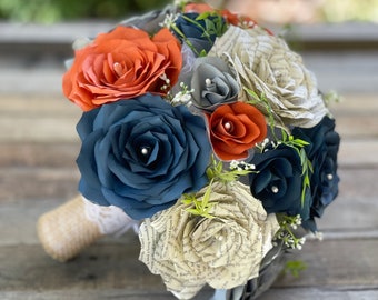 Bridal bouquet in burnt orange, navy blue and gray filter paper and book page paper flowers