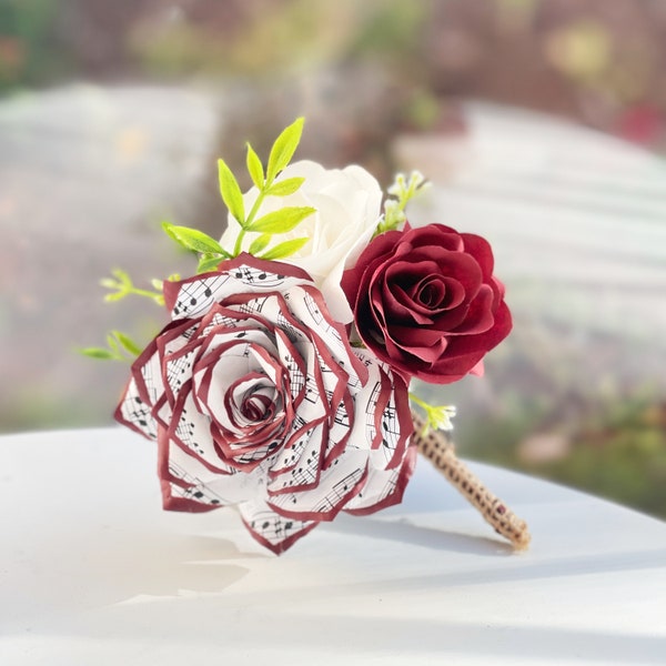 Music note paper rose boutonniere shown in burgundy - Customizable colors